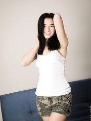 Enjoyable black haired coed Amy Smith removes sheer pants to masturbate her love tunnel