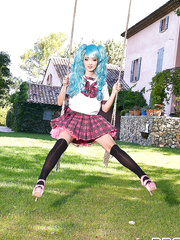 Cosplaying honey Lucie Wilde shows off her giant hooters outside