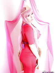 Cosplay angel Yuffie Yulan posing in constricted fitting suit and heels