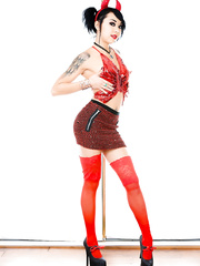 Oriental solo gal Kimberly Chi undresses to red nylons in devil's horns