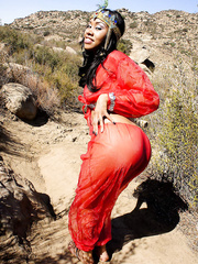 Darksome harem member Yasmine De Leon undresses bare on a filth trail thru the hills