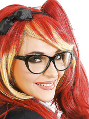 Foxy schoolgirl in glasses and fancy uniform uncovering her tiny curves