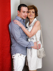 Excited granny flashes her pants previous to being in nature's garb by her toy chap