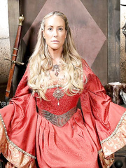 Older blond woman Brandi Love frees her large love bubbles from cosplay dress