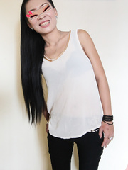 Slim legal age teenager Oriental Gi widens bare to flaunt her very unshaved bawdy cleft up close