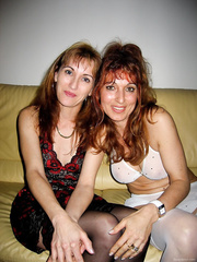 Two MILF get it on together and also with their husbands.