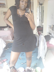 South Africa black friend taking pictures of herself in the mirror