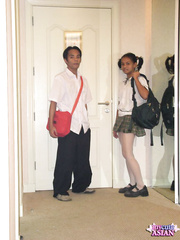 Oriental schoolgirl receives cum on her sinless looking face on her parent's couch