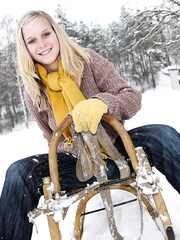 Breasty golden-haired bares large melons in the snow & sucks POV for mouthful of cum