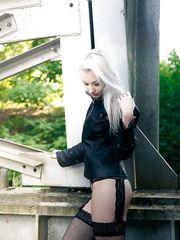 European legal age teenager Adelina White takes a pee on trestle bridge in darksome nylons