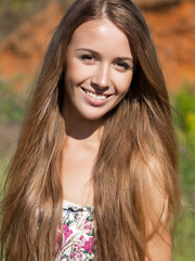 Slim lengthy-haired legal age teenager Lina disrobes out of her colorful costume outside