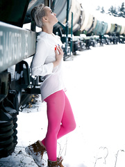 Short haired female displays her bawdy cleft by a teach in crotchless pantyhose