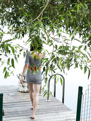 Valuable legal age teenager cutie walks to the end of the dock and disrobes undressed