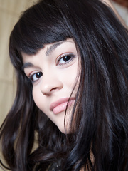 Diminutive titted model Shereen A in short costume widening legs to nude bushy slit