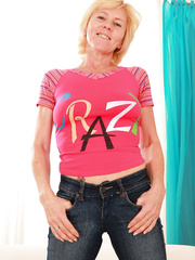 Breasty older golden-haired Hanela squats for a blowbang at end of a ribald group-sex