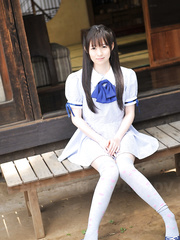 Japanese hotty Ai Uehara sits on the balcony and discloses her hairy wet crack