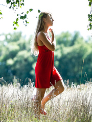 Hot legal age teenager Stella Lane heads into the woods for stripped modeling exhibition