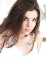 Diminutive white cutie discloses her natural wobblers in advance of displaying her shaved fur pie