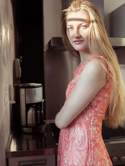 European female Bretona stretching out lengthy legs to display hairless cum-hole