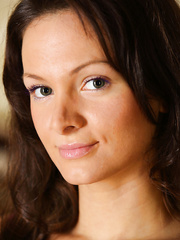 Legal Age Teenager female Zhanet A showing off her hard body in the in nature's garb on her sofa