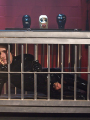 Femdom-Goddess Mona Wales frees her caged latex clad male sub for sexy love tunnel licking