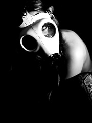 Perverteds solo beauty Dani Daniels flashes her titties whilst wearing a gas mask