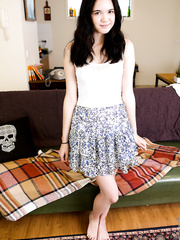 Darling little Lily Rei lifts up her short petticoat and fingers her widen slit