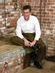 Dressed female Kym Wilde makes a stud undress to his underclothing and socks