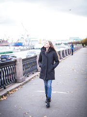 Gorgeous legal age teenager Nimfa pulls a red suit over her head to model in the exposed