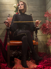 Maitresse Madeline Marlowe pegs her fully feminized sissy on a wooden table