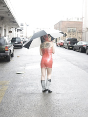 Absolutely moist pierced legal age teenager receives her latex costume off on a rainy day