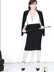 Lusty aged lady in formal dress and hose revealing her large milk sacks