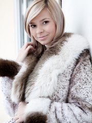 Dressed model Paloma B discloses exposed feet,strapon petite milk sacks and miniature hairless vagina