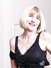 Golden-Haired grandmother Bossy Ryder tugging on labia lips after getting bare