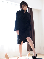 Japanese hotty with merry zeppelins and nude legs gives a footjob