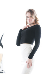 Delicious pornstar Jillian Janson performs a slow tantalizing striptease