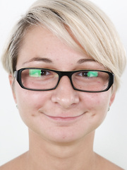 Short haired blond Marie removes her jeans & brassiere to show her nipps close up