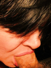 Sucking cock on a cold rainy night in November hubby took this photo