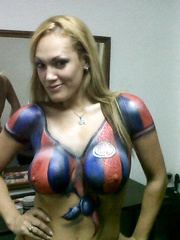 Pole dancing slut with body painted football shirt big boobs and nips