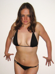 SEXY SHELLY in a black bikini and stripping to show sagging tits