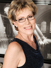 Over-thirty model Georgina C sucks on a finger during the time that masturbating in nylons