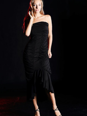 Nice-Looking blond model slides a lengthy darksome costume over her flawless body