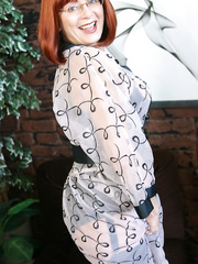 Hawt redhead mature mommy Miss Abigail shows naked gazoo bulky legs in underware