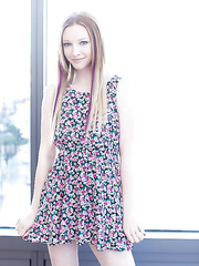 Natural redhead Katy Kiss exposing hairless cunt and hanging labia lips