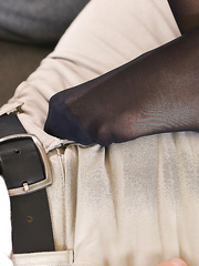 The nylon overspread feet of fully dressed lady Dolly Diore jerking dong