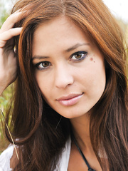 Erotic model Irina J baring miniature marangos outside & showing closeup gazoo