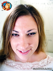 White floozy acquires on her knees to engulf off a dark knob at washroom gloryhole