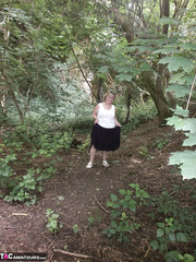 Aged non-professional bitch Caro masturbating on the bench in the woods