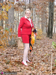 Sexually Excited granny Adonna removes her pants and toys herself in the woods