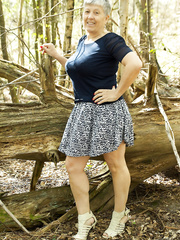 Gutsy old granny Savana shows off her tremendous saggy milk shakes in the forest